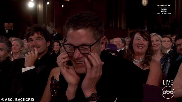 Jessie's husband Freddie looked delight as he watched from the audience