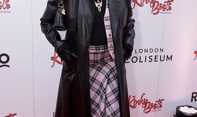 Joan Collins looked incredible in pink tartan as she stepped out to watch the gala performance of Kinky Boots at the London Coliseum on Sunday