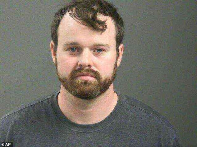 It comes two days after her husband was arrested in connection with allegations that he touched a nine-year-old girl on her underwear and genitals; his March 18 mugshot seen above