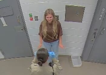 New footage reveals the moment that Kendra Duggar was booked into jail after her shocking arrest