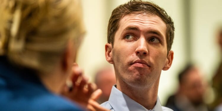 Tyler Robinson, who is accused of fatally shooting Charlie Kirk, is seen in a Dec. 15 photo at a hearing in Fourth District Court, in Provo, Utah.