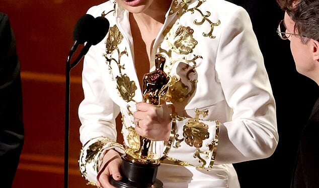 KPop Demon Hunters fans flew into a fury online after its musical number Golden won best original song at the Oscars - only for the writers to be cut off mid-speech; EJAE pictured