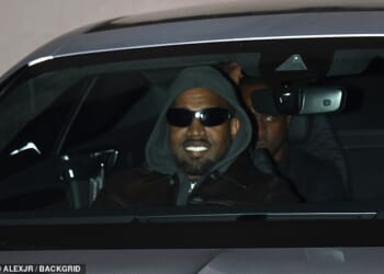 A beaming Kanye West's was spotted attending a listening party for his much delayed new album Bully in Los Angeles on Thursday evening