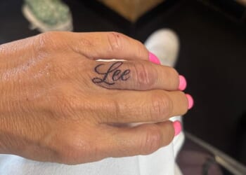 Katie Price has got a new tattoo of her husband Lee Andrews' name on her ring finger, just weeks after the pair tied the knot