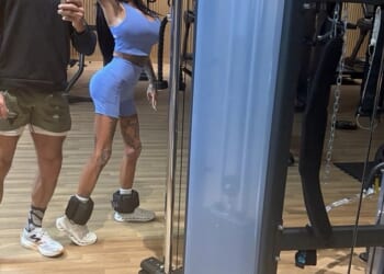 Katie Price hit the gym with her husband Lee Andrews as they posed for a mirror selfie for Instagram snaps in Dubai on Tuesday