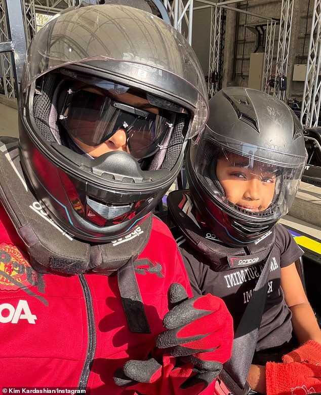 Kardashian brought three of her kids Saint, 10, Chicago , eight, and Psalm, six, along with her to Tokyo - and the group had a blast go-kart racing together