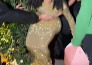 Kim Kardashian dramatically fell in her towering 'stripper heels' as she struggled to walk to the Vanity Fair Oscars party on Sunday