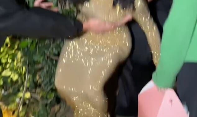 Kim Kardashian dramatically fell in her towering 'stripper heels' as she struggled to walk to the Vanity Fair Oscars party on Sunday
