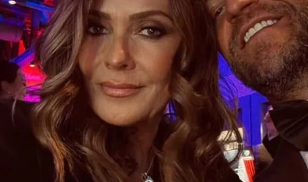 Kym Marsh is reportedly engaged to her fitness fanatic boyfriend Tom Dickinson after six months of dating (Pictured together)