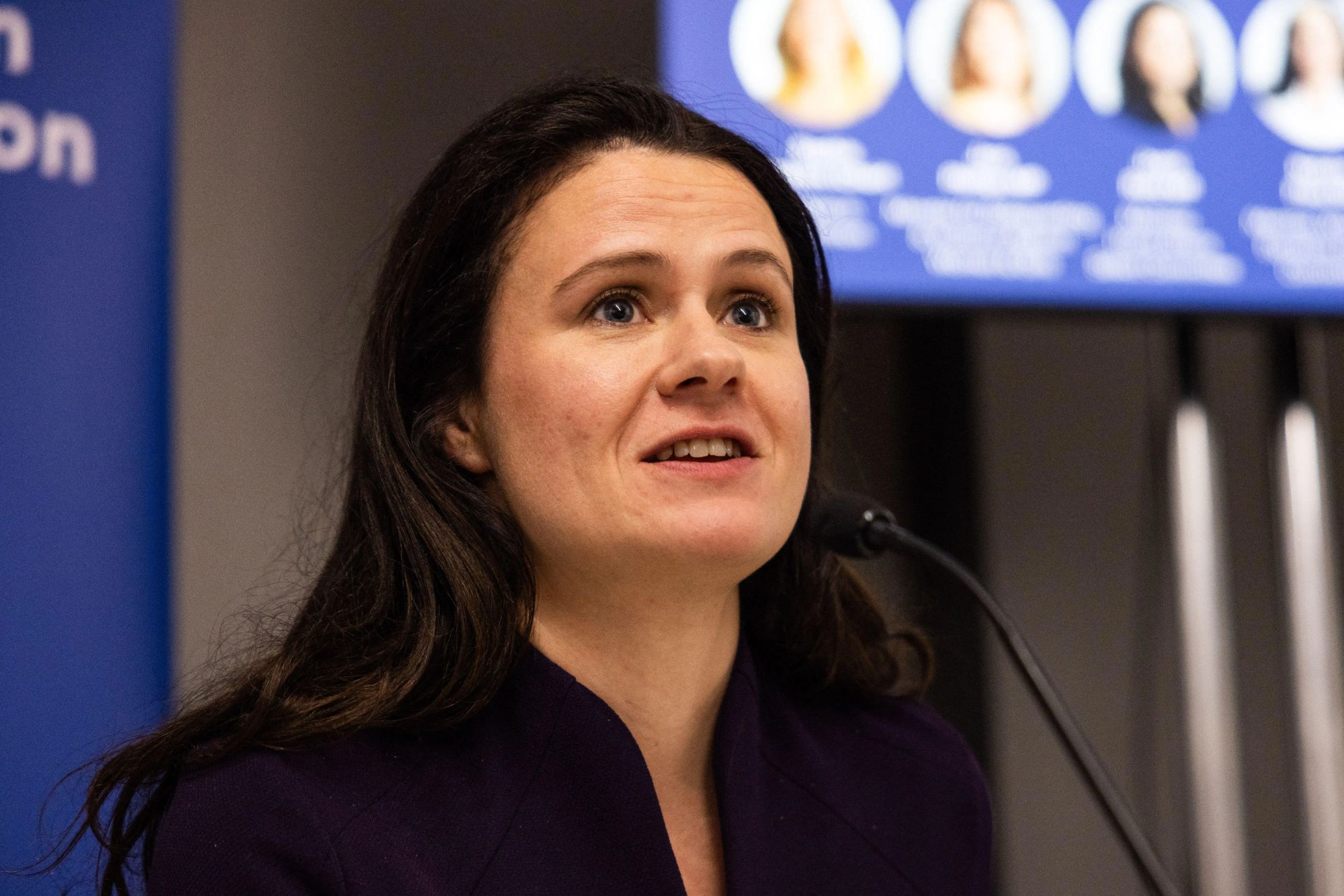 An image collage containing 1 images, Image 1 shows Joani Reid, MP for East Kilbride & Strathaven, speaking at an event on Violence Against Women and Girls (VAWG) at the Labour Party Conference