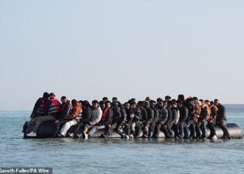 Migrants depart from Gravelines beach in northern France last week on a UK-bound dinghy