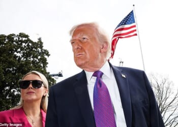 President Donald Trump speaks to reporters alongside White House Press Secretary Karoline Leavitt as he departs for Marine One on the South Lawn of the White House on March 11