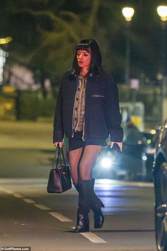 Lily looked effortlessly chic in a tweed cropped jacket and black mini skirt, while she added inches to her petite frame with heeled boots