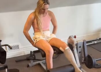 America ski hero Lindsey Vonn has been working out in the gym less than a month after nearly losing her leg