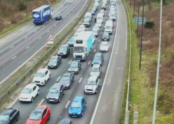 M62 closed in BOTH directions after crash as air ambulance lands on motorway with drivers facing hour-long delays