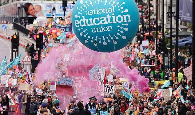 National Education Union members pictured during a strike in 2023 as a march made its way to a rally in Trafalgar Square