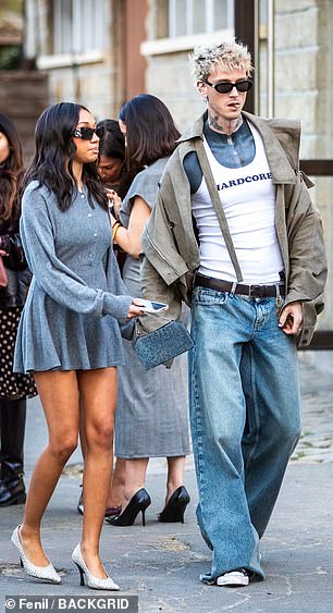 She added a pair of pointed-toe silver heels