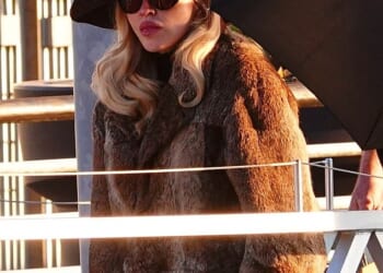 Madonna wrapped up in a brown fur coat as she stepped out in Venice with her boyfriend Akeem Morris on Friday