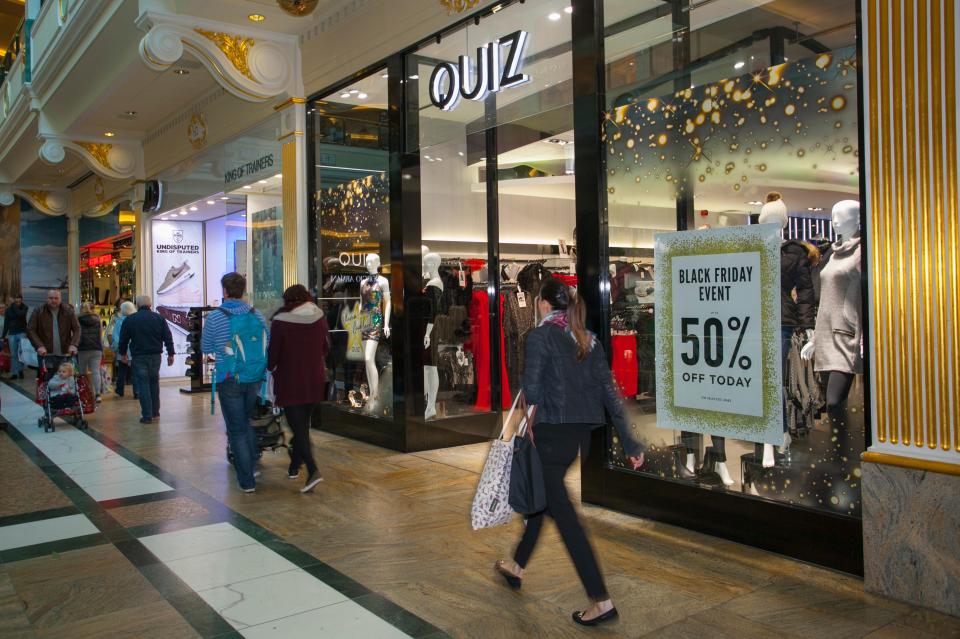 INTU Trafford Centre Manchester. UK 25th November, 2016. Black Friday Sales event Weekend. QUIZ City centre holiday shopping season, retail shops, fashion stores, Christmas shoppers, people discount sale shopping, and consumer spending on Black Fr