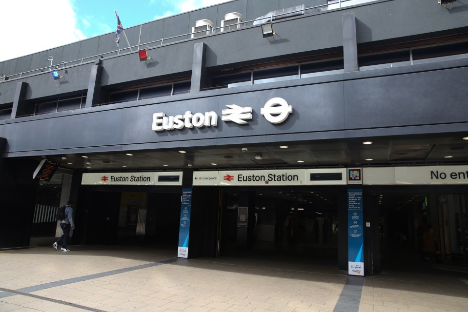 Exterior view of Euston railway station in central London, with its name and symbol above the entrance.
