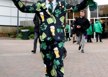 One racegoer donned a suit decorated with shamrocks, leprechaun hats and pints of beer. He finished the outfit with a green hat