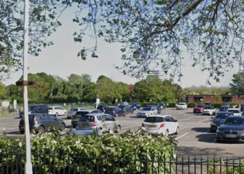 Man, 27, arrested after woman in her 20s raped near hospital in seaside town centre car park