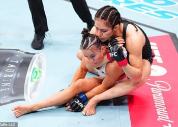 Alexa Grasso secures a rear chokehold against Maycee Barber, who already appeared KO'd