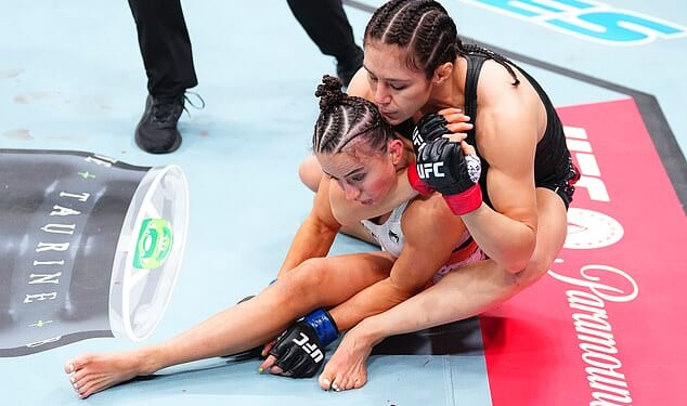 Alexa Grasso secures a rear chokehold against Maycee Barber, who already appeared KO'd