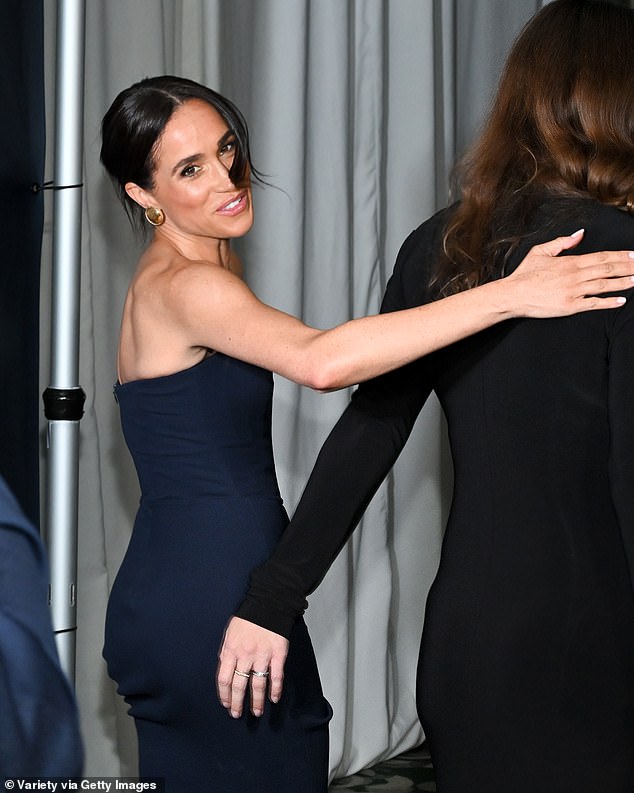 Meghan Markle was all smiles as she appeared on the red carpet at a charity bash alongside her best friend Kelly Zajfen