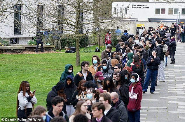Students queuing for antibiotics outside the University of Kent in Canterbury yesterday