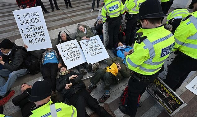 Police have arrested 18 Palestine Action supporters who were staging a protest outside New Scotland Yard today