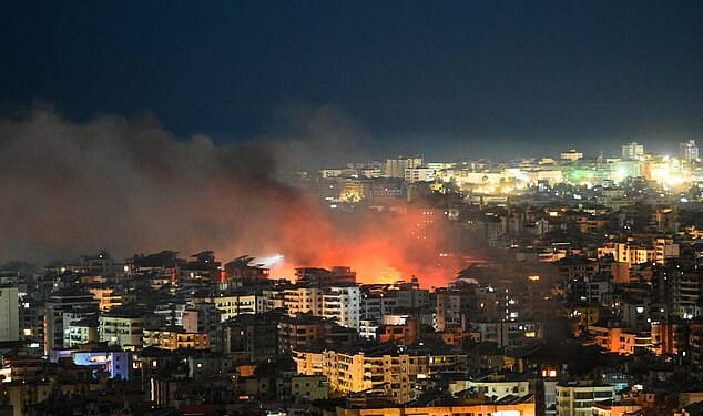 Fire rises from the site of an Israeli airstrike in the southern suburbs of Beirut early on March 6