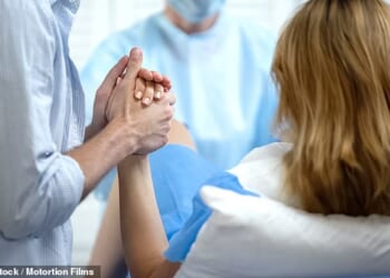 A labor and delivery nurse has shared the things men do in the delivery room that give her 'the ick' (stock image)