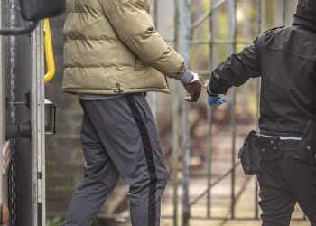 Oladele faces a 'long sentence' after he forced a woman down a woodland path and raped her