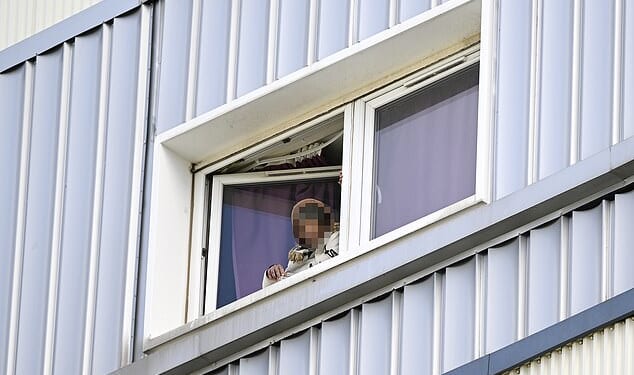 An immigrant from Chad has been charged after two people were hospitalised by a man allegedly roaming the streets of Edinburgh with knives