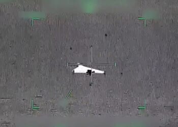 The UAE Foreign Ministry released dramatic footage of the country's air defences hunting down and shooting Iranian drones. Pictured: An Iranian drone lined up in crosshairs