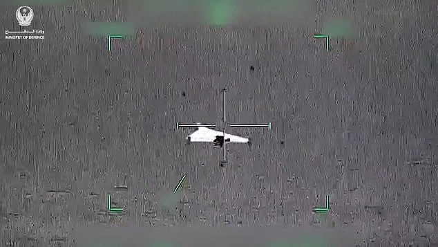 The UAE Foreign Ministry released dramatic footage of the country's air defences hunting down and shooting Iranian drones. Pictured: An Iranian drone lined up in crosshairs