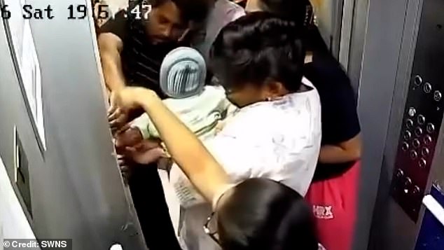 CCTV footage captured the terrifying moment a baby's arm got stick in the door of a lift in a housing society in Pune, Maharashtra in western India