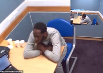 Michael Ahanonu told police he could not remember the killing. He was captured laughing during a police interview (pictured), telling officers: ''If I don’t laugh, I cry.'