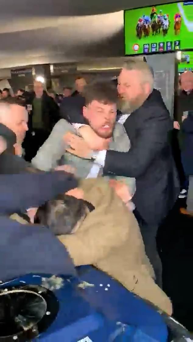 A chaotic brawl broke out among a group of men inside the event on Tuesday