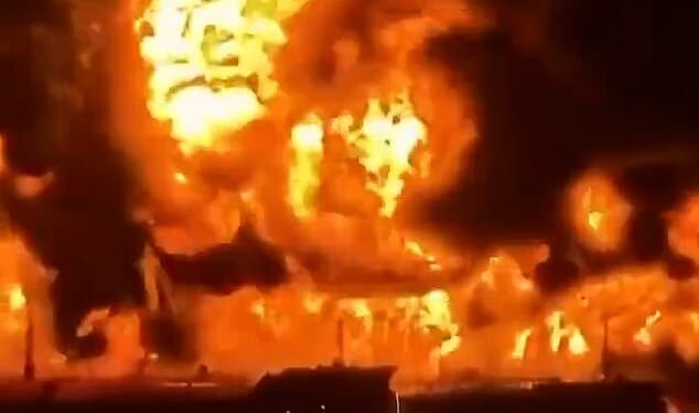 This is the moment Iraqi oil tankers erupt into flames after being struck by explosive-filled Iranian boats