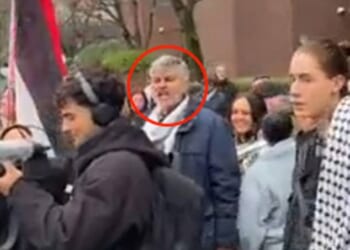 Moment organiser of London's Al-Quds 'hate rally' shouts 'death to the IDF' at Iran protest before leading chants of 'Khamenei makes us proud'