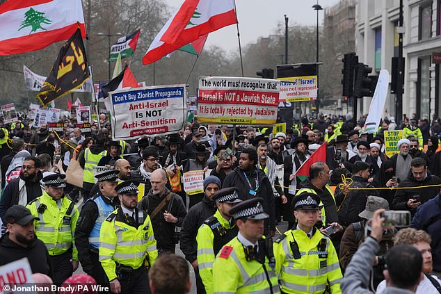 People take part in an Al-Quds march in London on March 23, 2025