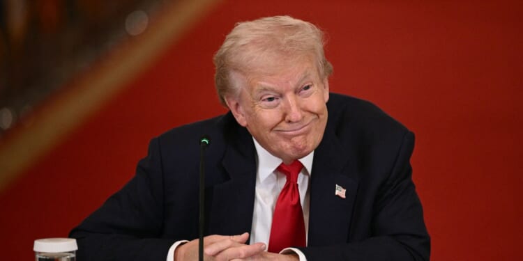 President Donald Trump listens during a roundtable to "save college sports" in the East Room of the White House in Washington, D.C., on March 6, 2026.