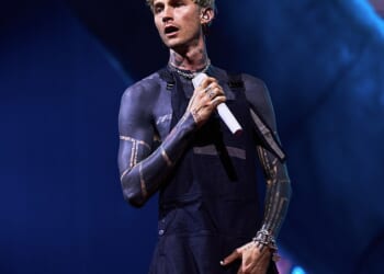 A Machine Gun Kelly fan suffered a mortifying moment after falling through a hole in the stage during the rapper's London concert on Thursday (seen above)