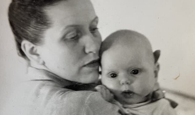 Beatrice holds a newborn Alexandra - decades later, the child became the carer