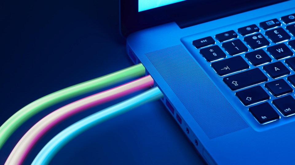 Laptop with high-speed fiber optic cables.