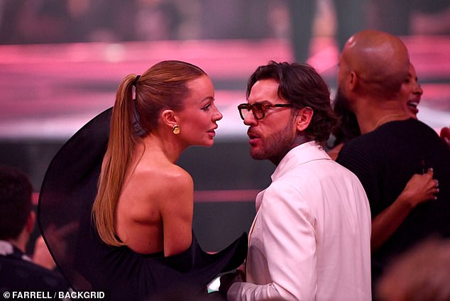 The pair were seen locking lips at the Flute Bar in Soho on Friday night - after her split from her husband Bradley Dack at the start of this year (pictured last month)