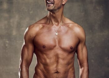 Paddy McGuinness showed off his six-pack and bulging biceps as he posed shirtless in a new photoshoot on Tuesday