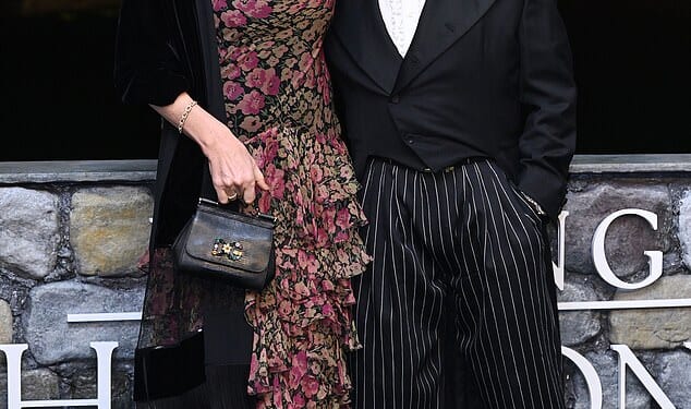 Penny Lancaster said Rod Stewart is 'demanding and still lays it on thick' as she revealed how they keep their sex life 'hot' in a new interview on Friday (pictured last month)